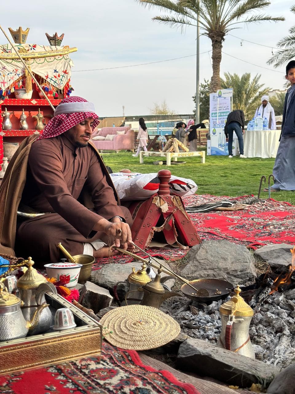 Roasting coffee beans and preparing Saudi coffee
